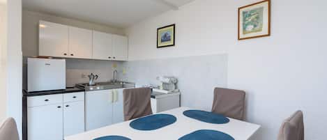 Apartment (A1) | Private kitchen | Fridge, stovetop, espresso maker, electric kettle