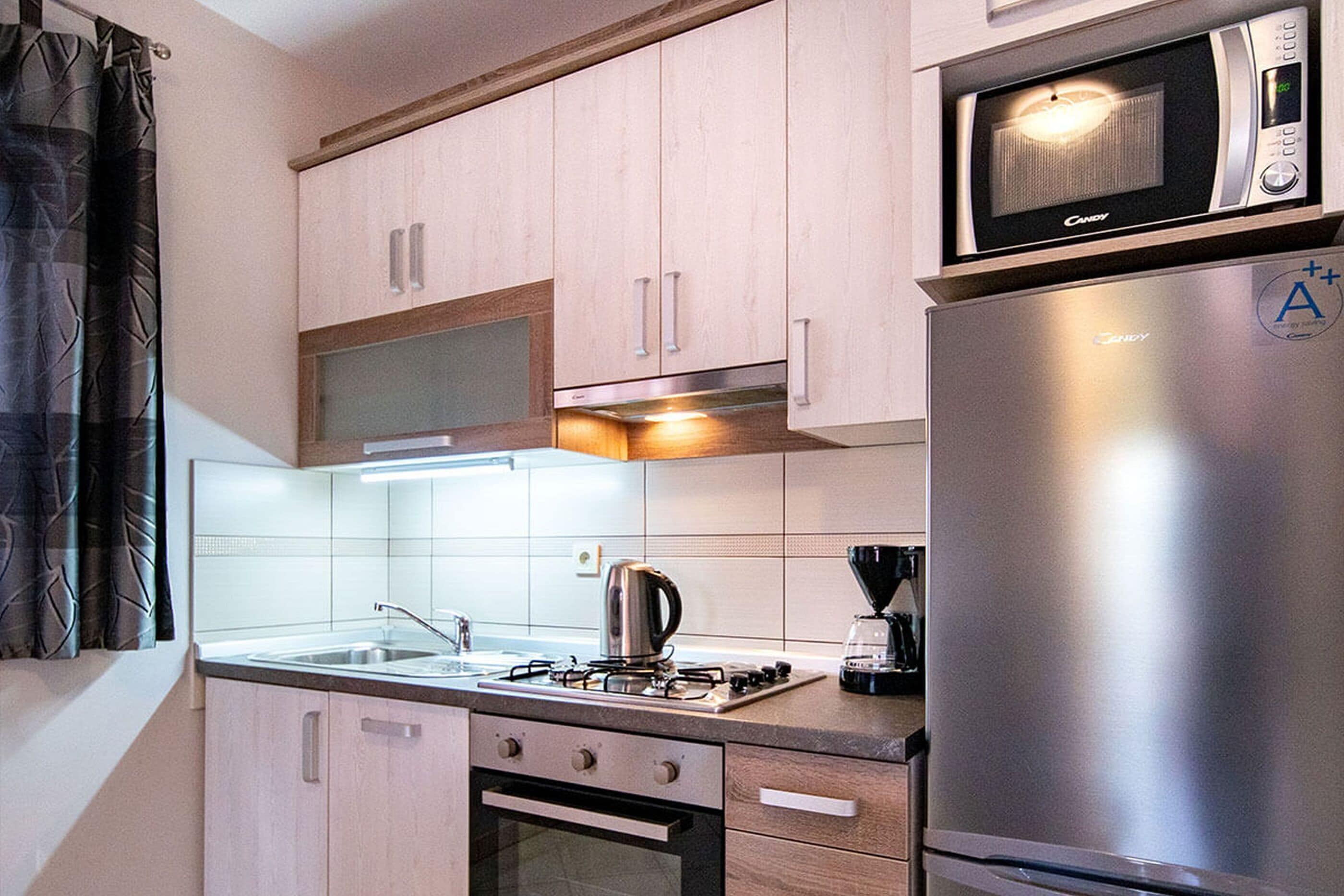 Appartamento (A3) | Cucina privata | Macchina per caffè espresso, frigorifero, microonde, forno