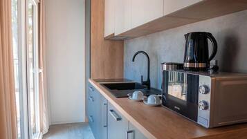 Hus | Privat køkken | Espressomaskine, køleskab, mikrobølgeovn, kogeplade