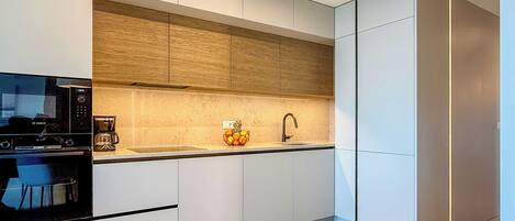 Apartment (A1) | Private kitchen | Fridge, microwave, oven, stovetop