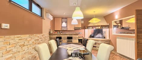 Villa | Private kitchen | Fridge, microwave, oven, stovetop