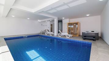 Indoor pool, a heated pool, open open 24 hours a day, pool loungers