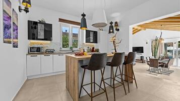 Villa | Private kitchen | Espresso maker, coffee/tea maker, fridge, microwave