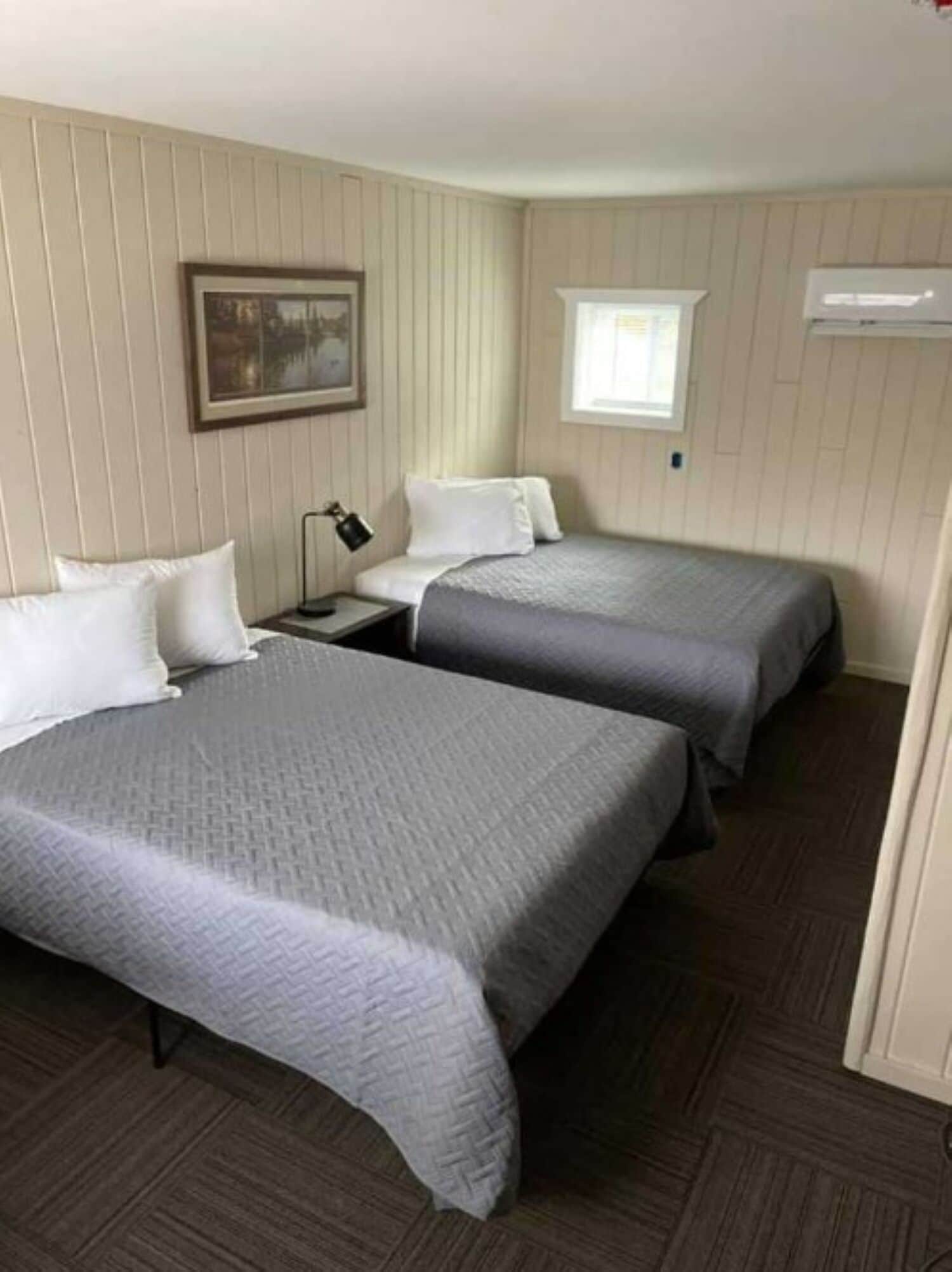 Unwind in crisp twin beds after a day outdoors.