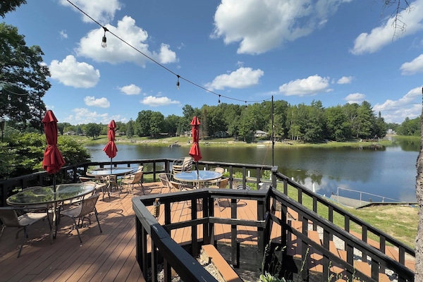 Sip coffee on the deck with peaceful lake views.