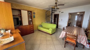 Villa, Ocean View | Living area | 34-inch flat-screen TV with satellite channels - Itaca House - ChiacchioProperty (Villammare)