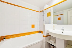 Toalhas de banho, papel higiênico