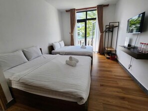 Quarto quádruplo | Wi-Fi de cortesia, roupa de cama