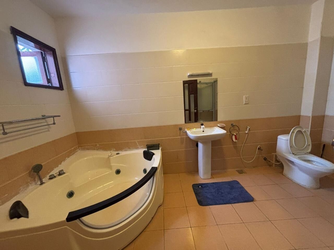 Shower, jetted tub, towels, soap