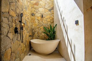 Deluxe Double Room, Hill View | Bathroom | Towels, soap, shampoo, toilet paper - Sereno Lombok Resort (Kabupaten Lombok Tengah)