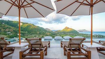 Outdoor pool, open 8:00 AM to 8:00 PM, pool loungers