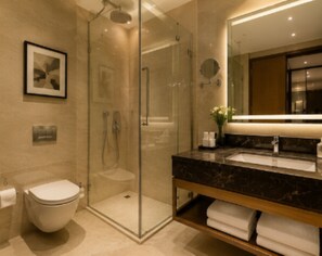 Ducha, artículos de tocador gratuitos, toallas, jabón