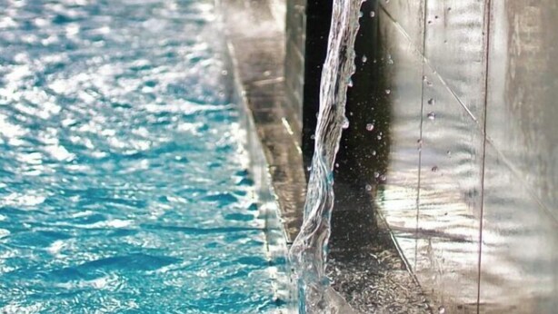 A water feature with multiple streams of water flowing into a pool. - Reata Apartment Hotel (Nairobi)