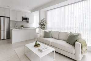 Economy Suite | Living area - Harbour & Hearth Suites (Toronto)