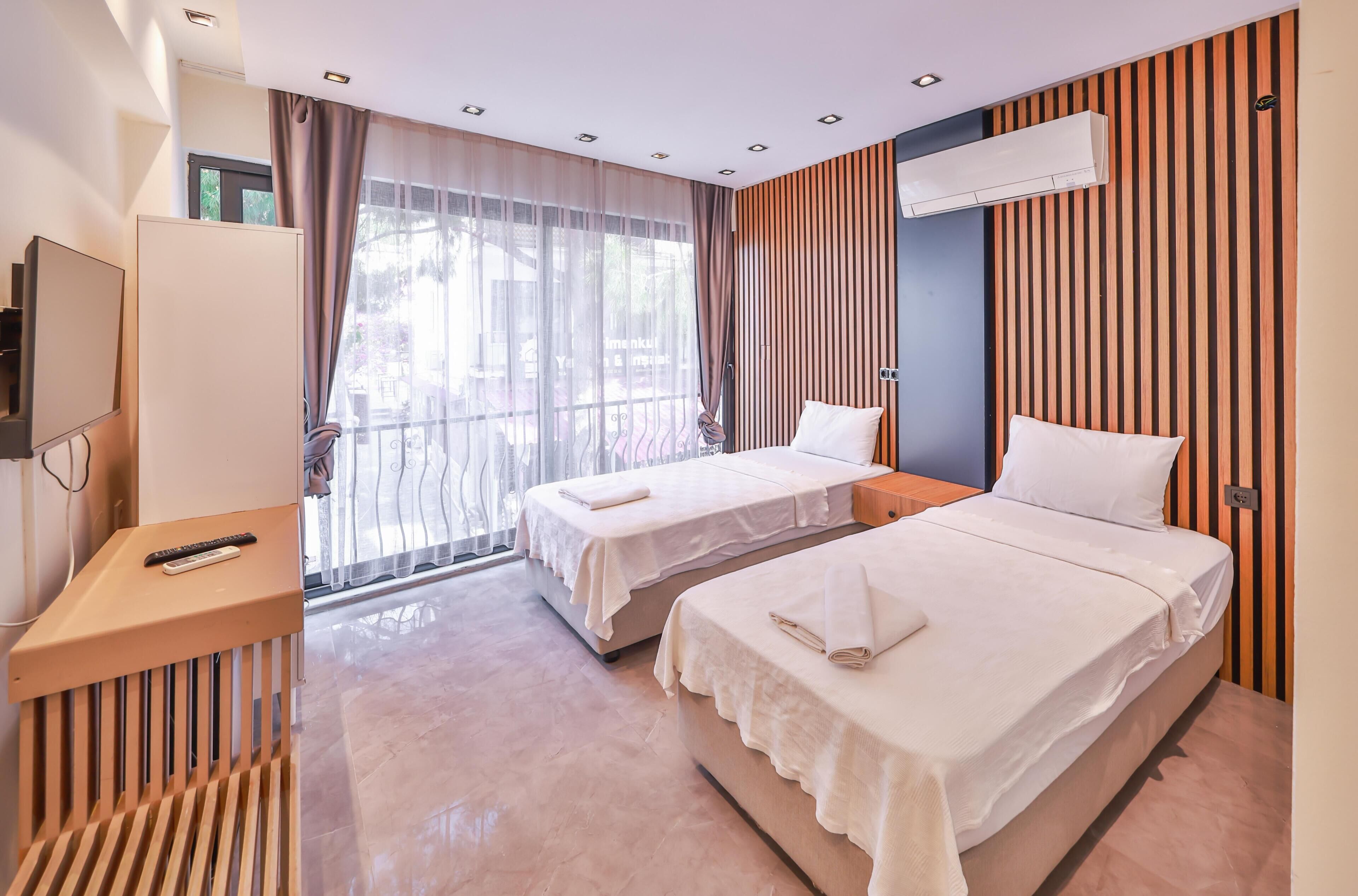 Chambre Deluxe avec lits jumeaux, vue ville | Wi-Fi gratuit, draps fournis