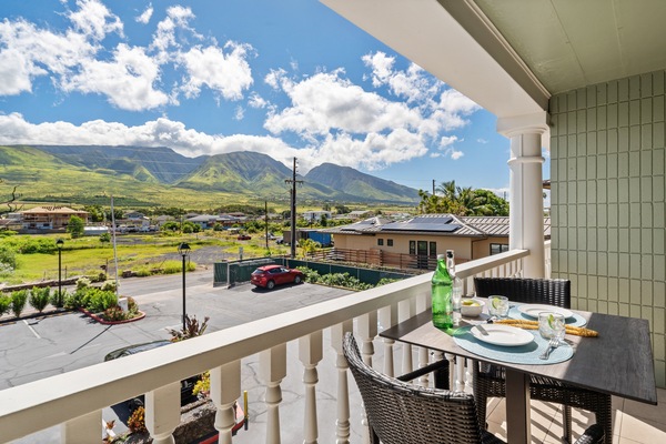 Step out onto your private balcony to enjoy breathtaking views of the mountain range under a vast island sky