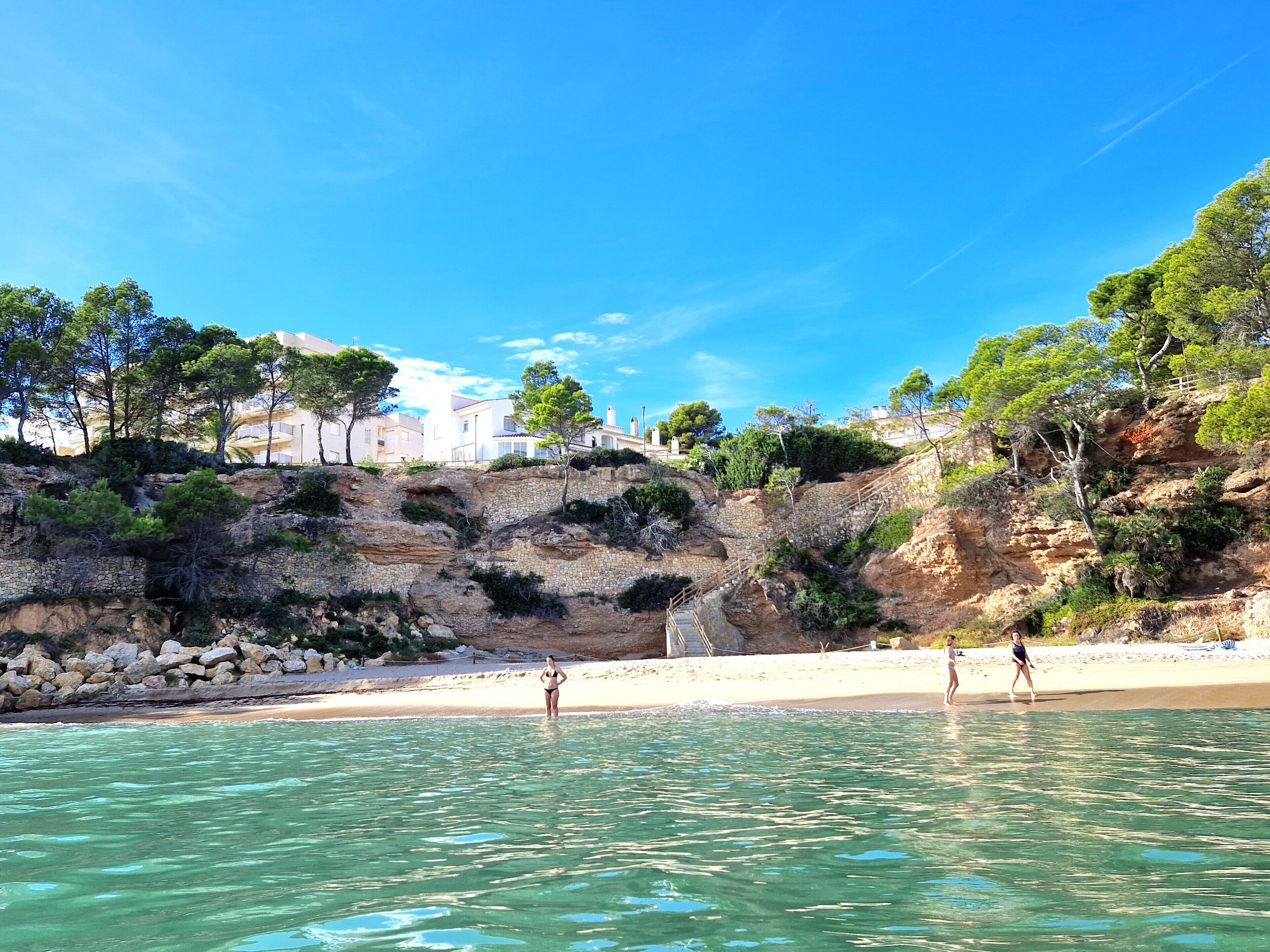 On the beach, sun loungers, beach towels