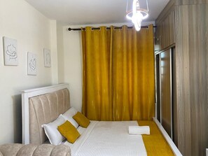 1 bedroom, iron/ironing board, WiFi - Cozy Airbnb Studio with lift ,Parking, Security 24hrs near JKIA (Nairobi)