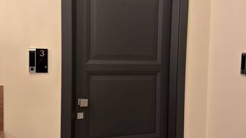 Deluxe kamer, 1 twee- of 2 eenpersoonsbedden | Interieur