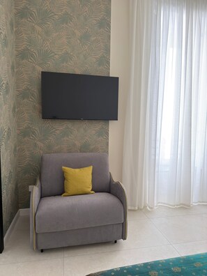 Camera Deluxe con letto matrimoniale o 2 letti singoli | Area soggiorno
