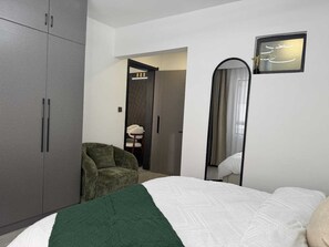 Comfort Apartment, 2 Bedrooms, Balcony, Pool View | Iron/ironing board, free WiFi - Urban stays (Nairobi)