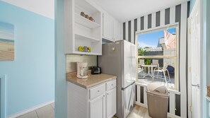 Fridge, microwave, oven, stovetop - Bluewater Bungalow | Lagoon-Front Duplex Near Beach & Boat Dock (PCB)