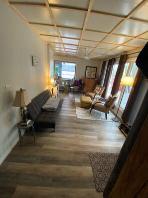 Living area - Peaceful and cozy cottage on small quiet lake -family and pet friendly as well! (Elgin)
