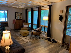 Living area - Peaceful and cozy cottage on small quiet lake -family and pet friendly as well! (Elgin)