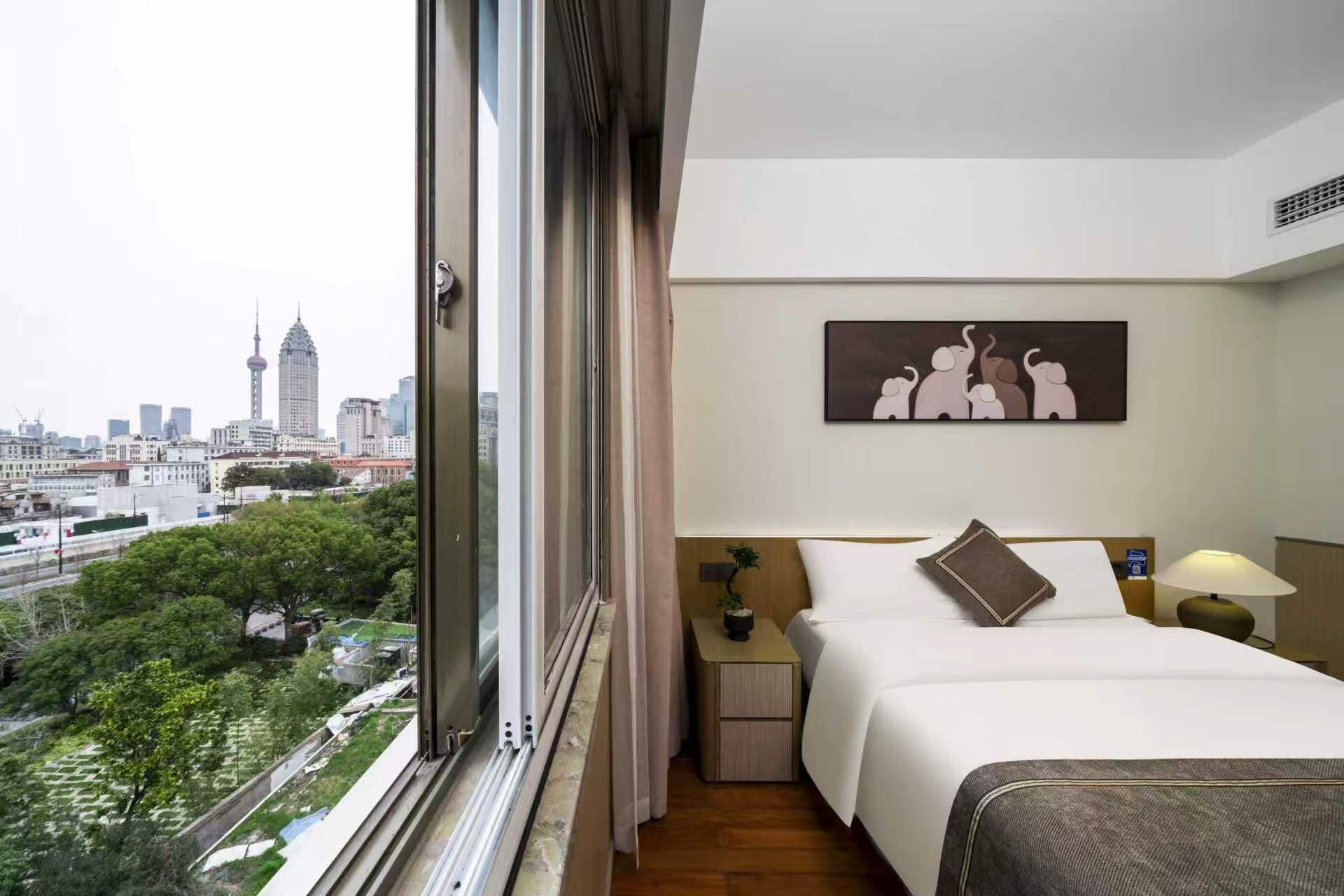 Basic Double Room, City View | Desk, laptop workspace, blackout drapes, iron/ironing board