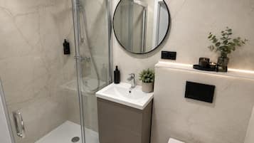 Hair dryer, towels, soap, shampoo