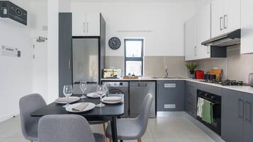 Luxury Apartment, Executive Level (Luxury2-Bedroom Upper Floor Apartment) | Private kitchen | Full-size fridge, microwave, oven, stovetop