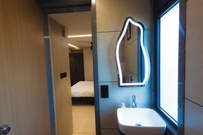 Shower, towels, soap, toilet paper - Nirrtul Sapphire Studio Apartment Specious Cozy & Quite (Surat)