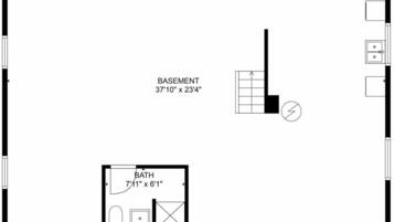Plano de planta de una habitación de hotel, con un sótano de 11,4 metros cuadrados y un baño de 4,3 metros cuadrados.