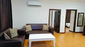 Suite, 2 Bedrooms | Living area | 43-inch flat-screen TV with satellite channels, printers