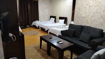 Deluxe driepersoonskamer, 3 eenpersoonsbedden | Lakens van Egyptisch katoen, luxe beddengoed, verduisterende gordijnen