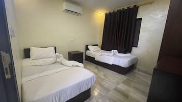 Family Suite, 3 Bedrooms | Egyptian cotton sheets, premium bedding, blackout drapes, soundproofing