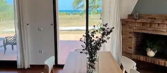 Ginjol Sunset Beachfront Cottage