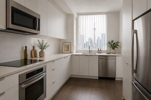 Junior Room, City View | Private kitchen | Fridge, microwave, oven, stovetop - Aurelia Downtown Suites (Toronto)