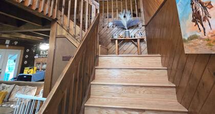 3-bedroom log cabin backs up to wooded lot for maximum peace and quiet!