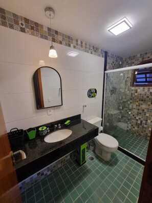 Shower, towels, soap, toilet paper