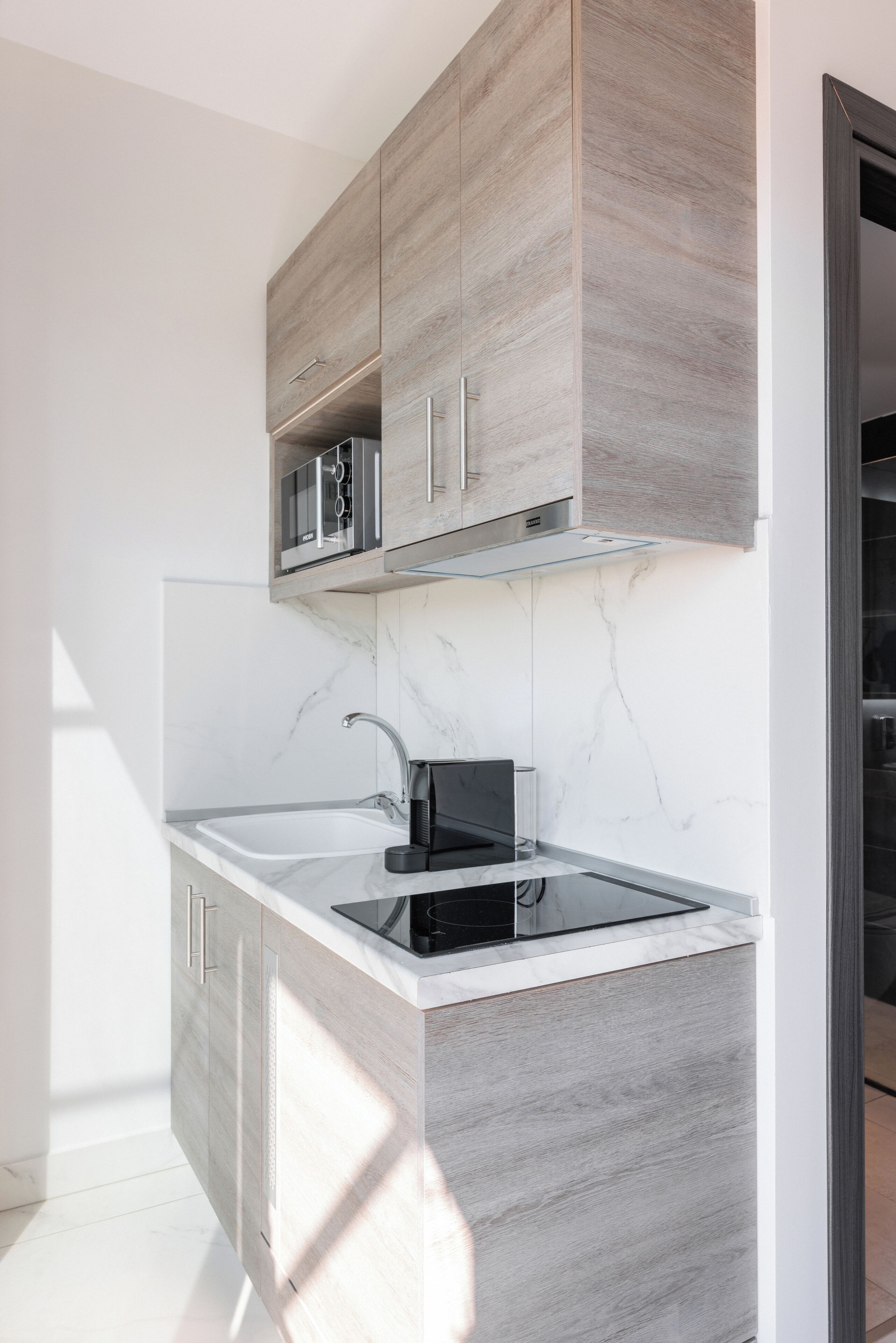 Mini-fridge, microwave, stovetop, espresso maker