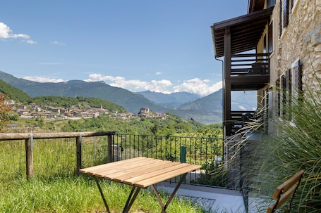 Terrace/patio. Casa Zucchelli, Garda Trentino: Castle View, Private Garden with BBQ, Up to 8 Guests