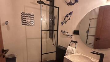 Separate bathtub and shower, deep-soaking bathtub, hair dryer, towels