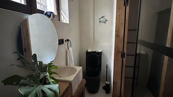 Separate bathtub and shower, deep-soaking bathtub, hair dryer, towels