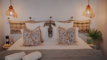 Deluxe Apartment, Pool View | In-room safe, blackout drapes, soundproofing, iron/ironing board