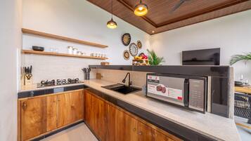 Family Villa, 4 Bedrooms, Private Pool | Private kitchen | Spices, eco-friendly cleaning products, paper towels, kitchen islands