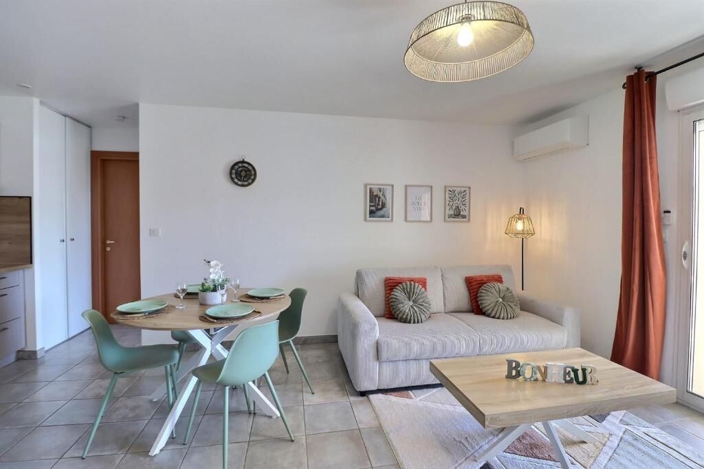 Comfort Apartment, Balcony, City View | Living area | 130-cm Smart TV with digital channels