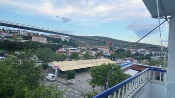 Standard Triple Room, Balcony, City View | Property grounds