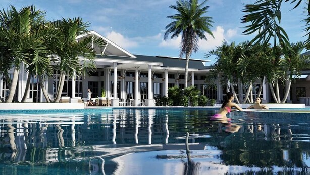 A resort with a swimming pool, palm trees, and a large building with columns. - Brand New 10BR 8BA/Themed BR/PrivatePool/SPA 16276 (Clermont)
