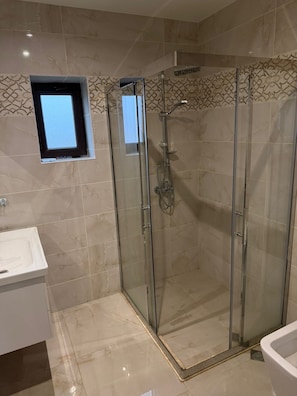 Shower, hair dryer, towels, soap